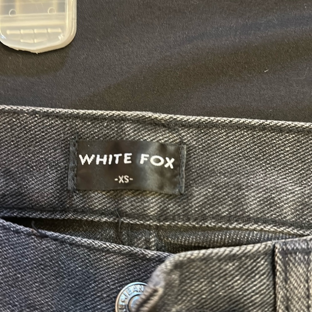 White fox black jeans